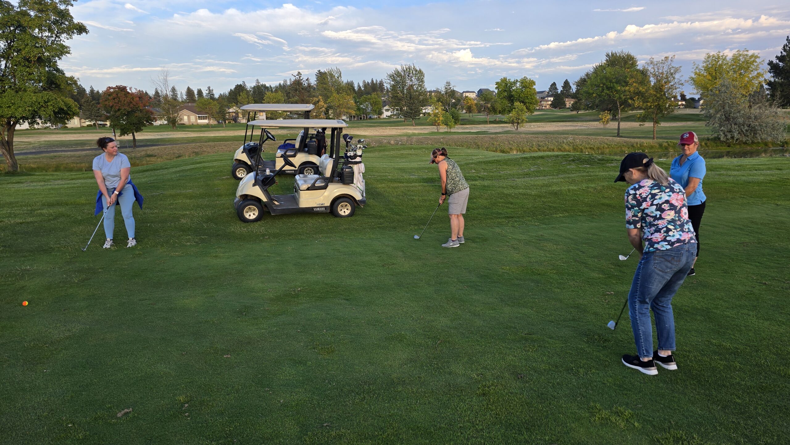 Ladies Sip and Swing group on the golf course